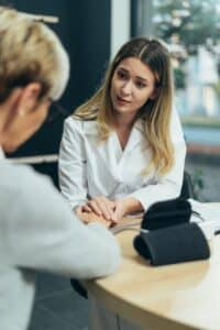 a therapist and a patient discussing online marriage counseling near me