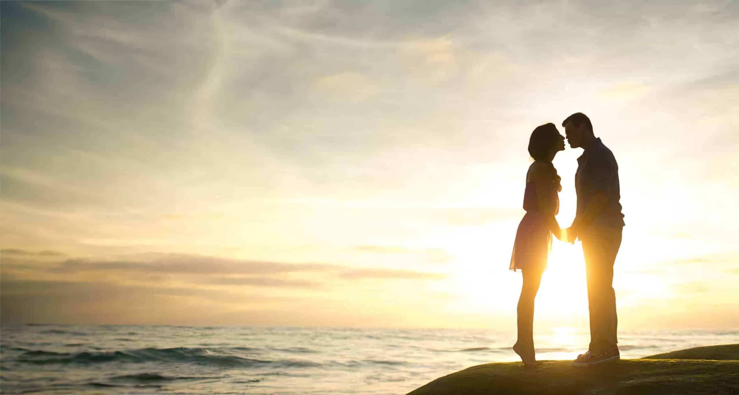 a happy man and woman at sunset in love thanks to marriage counseling south carolina