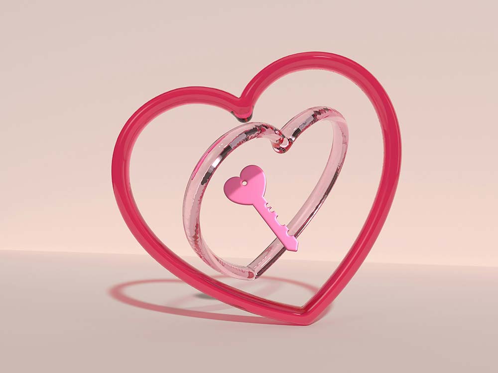 A Pink Heart Shaped Object with a Key Inside of It