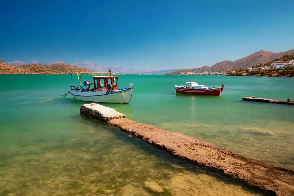 Boats floating on the water.